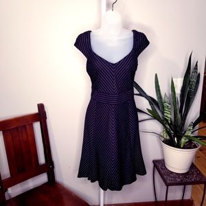 Flattering black dress with white pin stripes